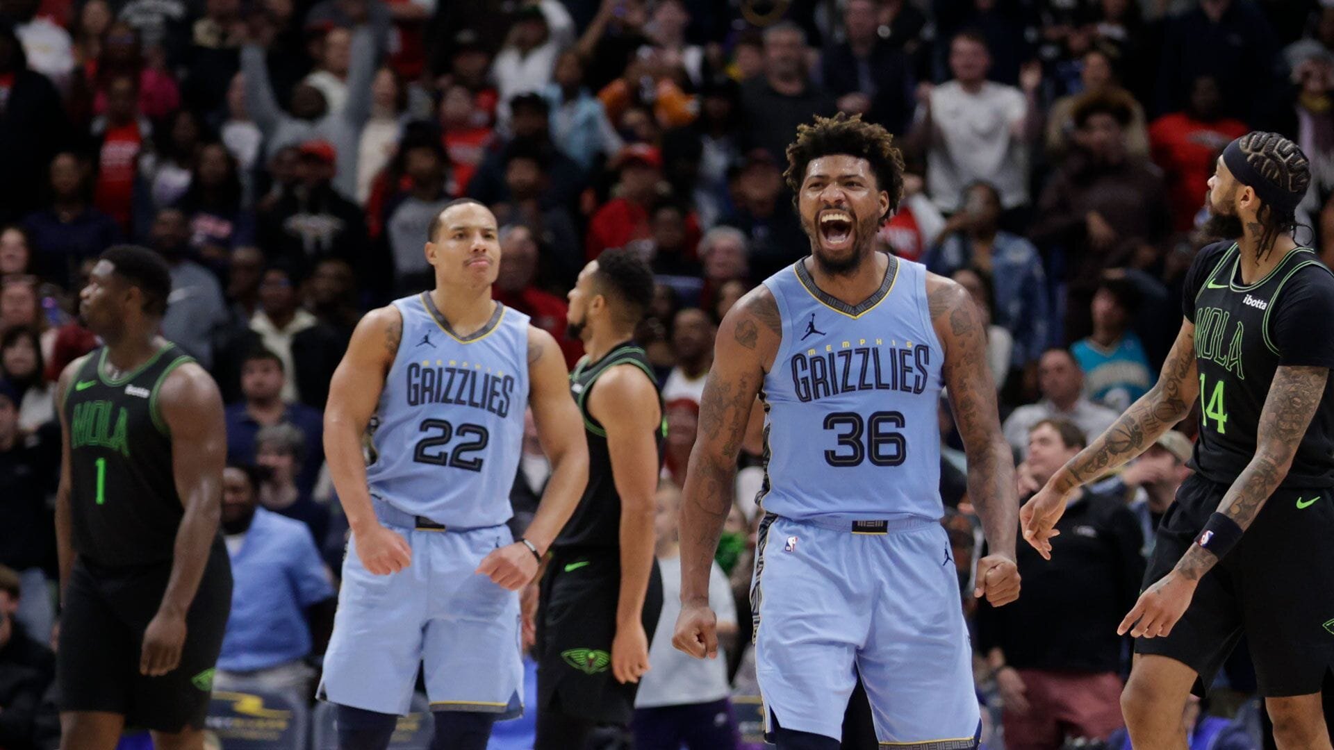 NEW ORLEANS, LA - DECEMBER 26: Desmond Bane #22 and Marcus Smart #36 of the Memphis Grizzlies celebrate during the game against the New Orleans Pelicans on December 26, 2023 at the Smoothie King Center in New Orleans, Louisiana.