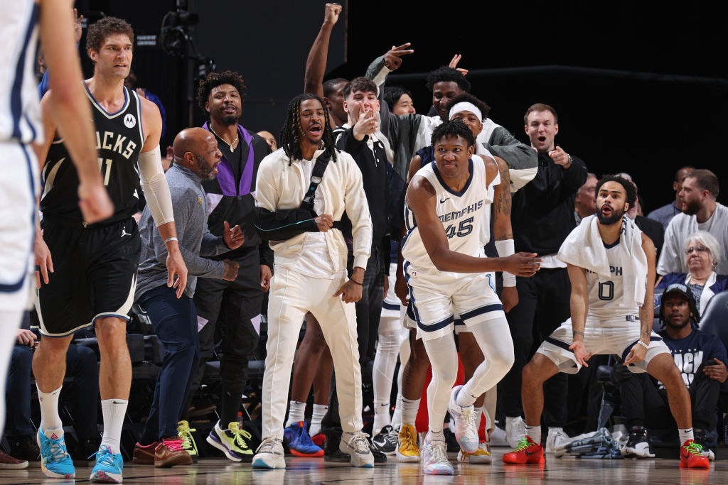 MEMPHIS, TN - FEBRUARY 15: The Memphis Grizzlies bench celebrates a three point basket during the game against the Milwaukee Bucks on February 15, 2024 at FedExForum in Memphis, Tennessee.
