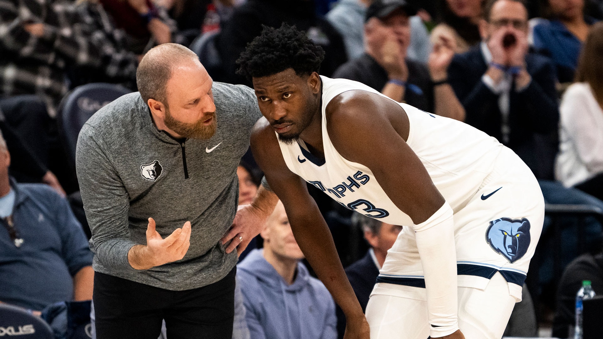 MINNEAPOLIS, MINNESOTA - FEBRUARY 28: Taylor Jenkins head coach of the Memphis Grizzlies speaks with Jaren Jackson Jr. #13 in the fourth quarter of the game against the Minnesota Timberwolves at Target Center on February 28, 2024 in Minneapolis, Minnesota.