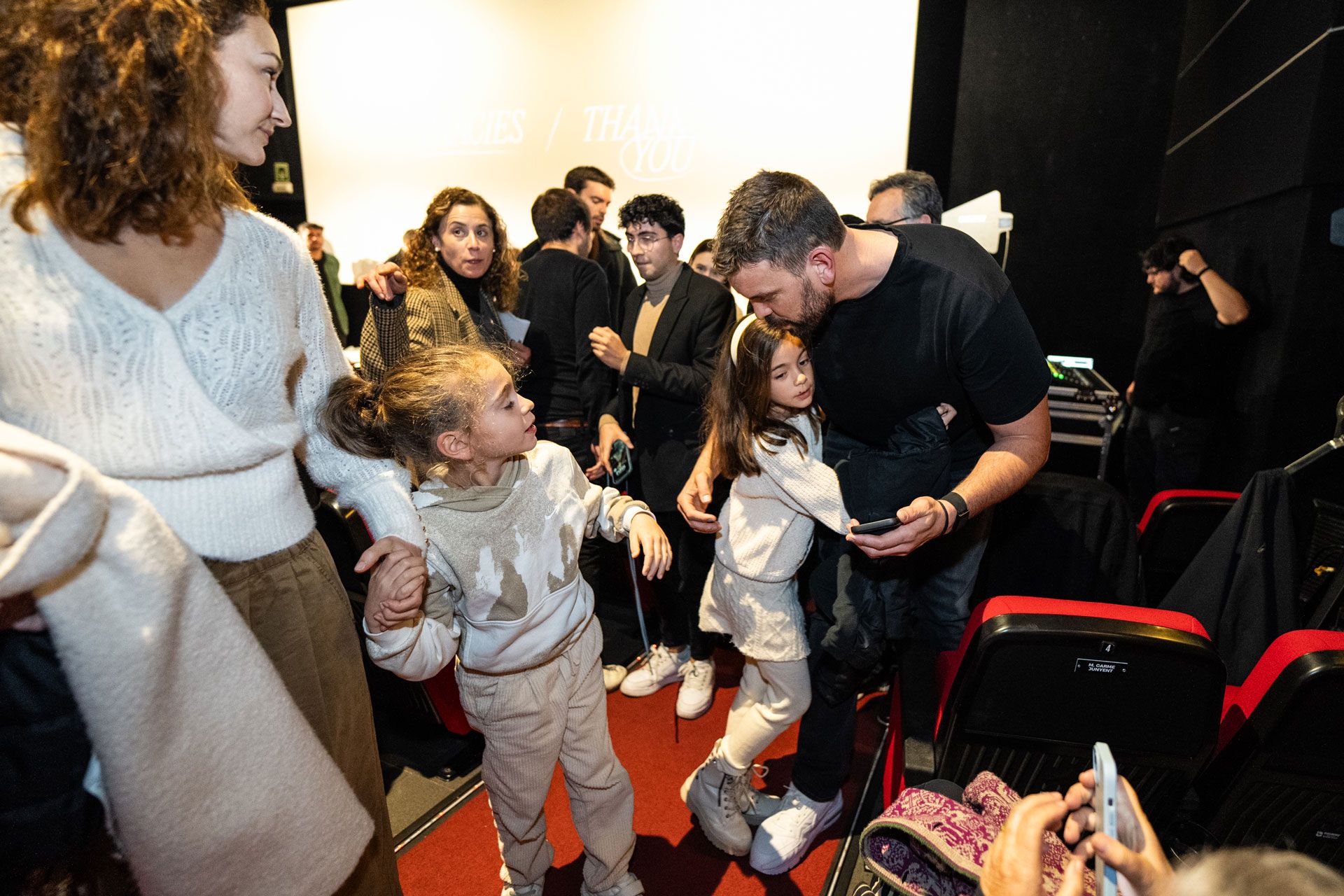 BARCELONA, SPAIN - JANUARY 31: Marc Gasol hugs his family as wife Cristina Blesa looks on at the cinema where he has just announced his retirement after 20 years in basketball on January 31, 2024 in Barcelona, Spain. The Spanish center hit big career highs, scoring three All-Star selections, grabbing an NBA title with the Toronto Raptors, and being named the NBA's Defensive Player of the Year in 2012-13.