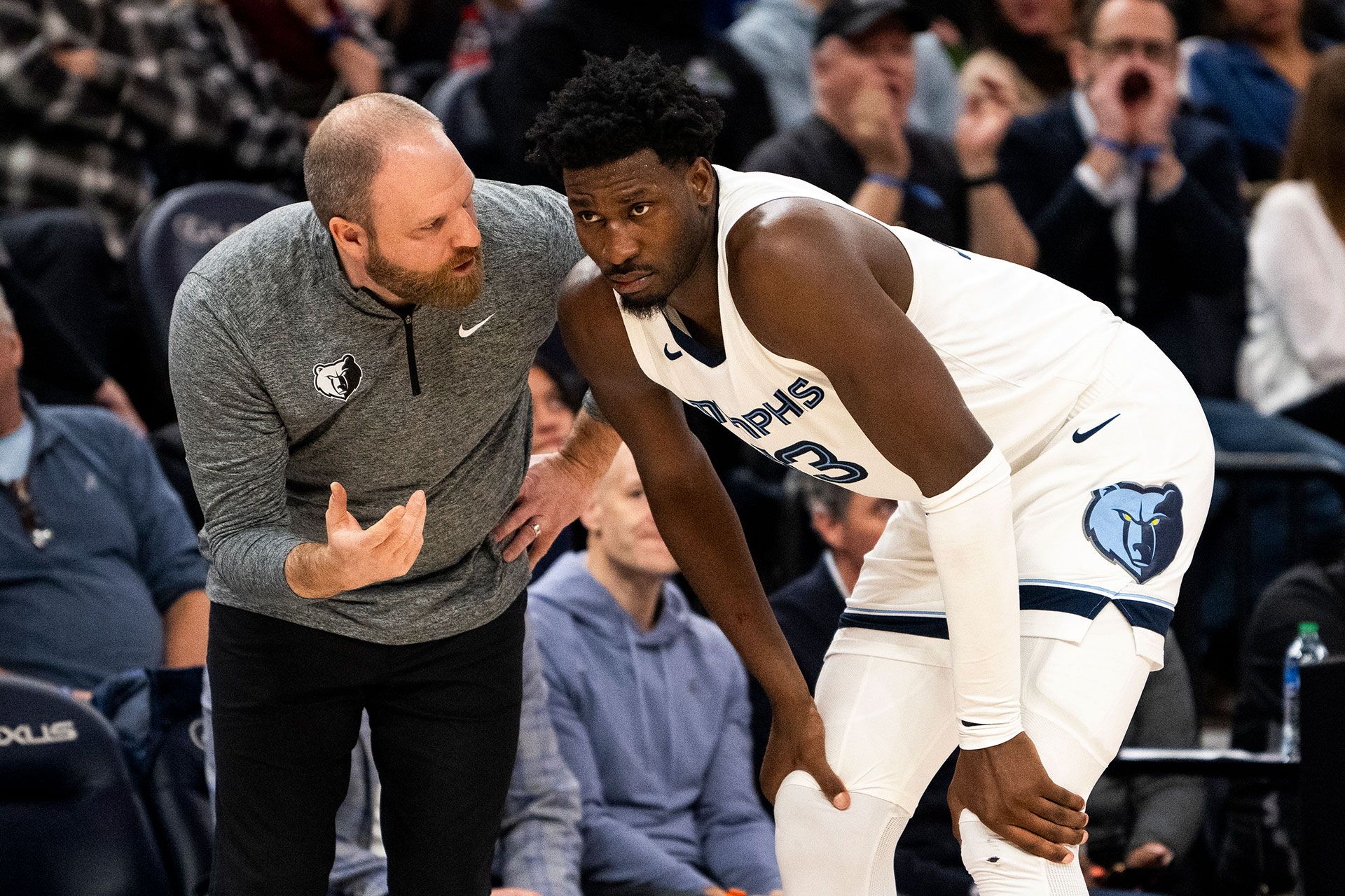 MINNEAPOLIS, MINNESOTA - FEBRUARY 28: Taylor Jenkins head coach of the Memphis Grizzlies speaks with Jaren Jackson Jr. #13 in the fourth quarter of the game against the Minnesota Timberwolves at Target Center on February 28, 2024 in Minneapolis, Minnesota.