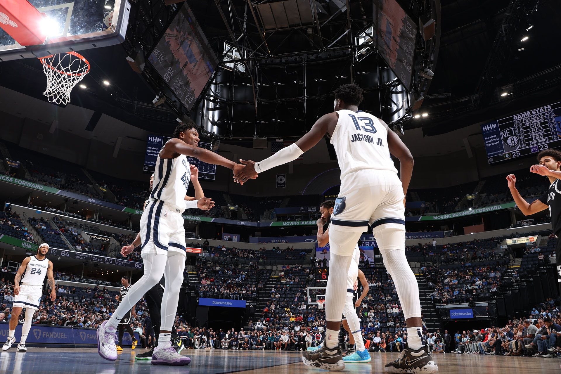 MEMPHIS, TN - February 26:  Jaren Jackson Jr. #13 and GG Jackson #45 of the Memphis Grizzlies celebrate during the game against the Brooklyn Nets on February 26, 2024 at FedExForum in Memphis, Tennessee.