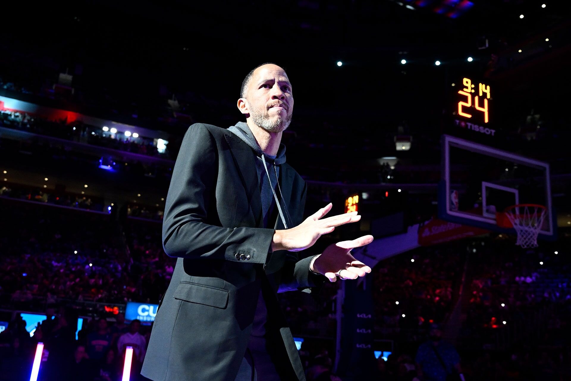 DETROIT, MI - MARCH 17: Tayshaun Prince walks on the court during the 2004 NBA Championship 20th Anniversary Recognition  on March 17, 2024 at Little Caesars Arena in Detroit, Michigan.