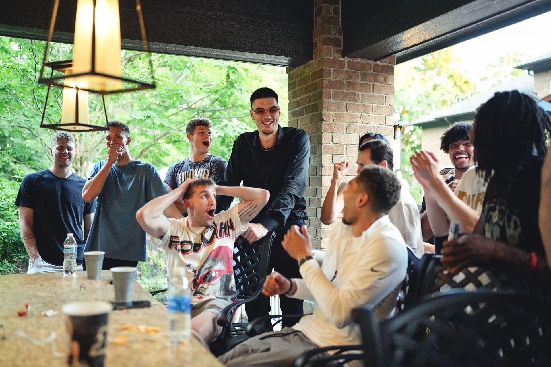 Zach Edey celebrates with his Purdue teammates, including a shocked and surprised Braden Smith.