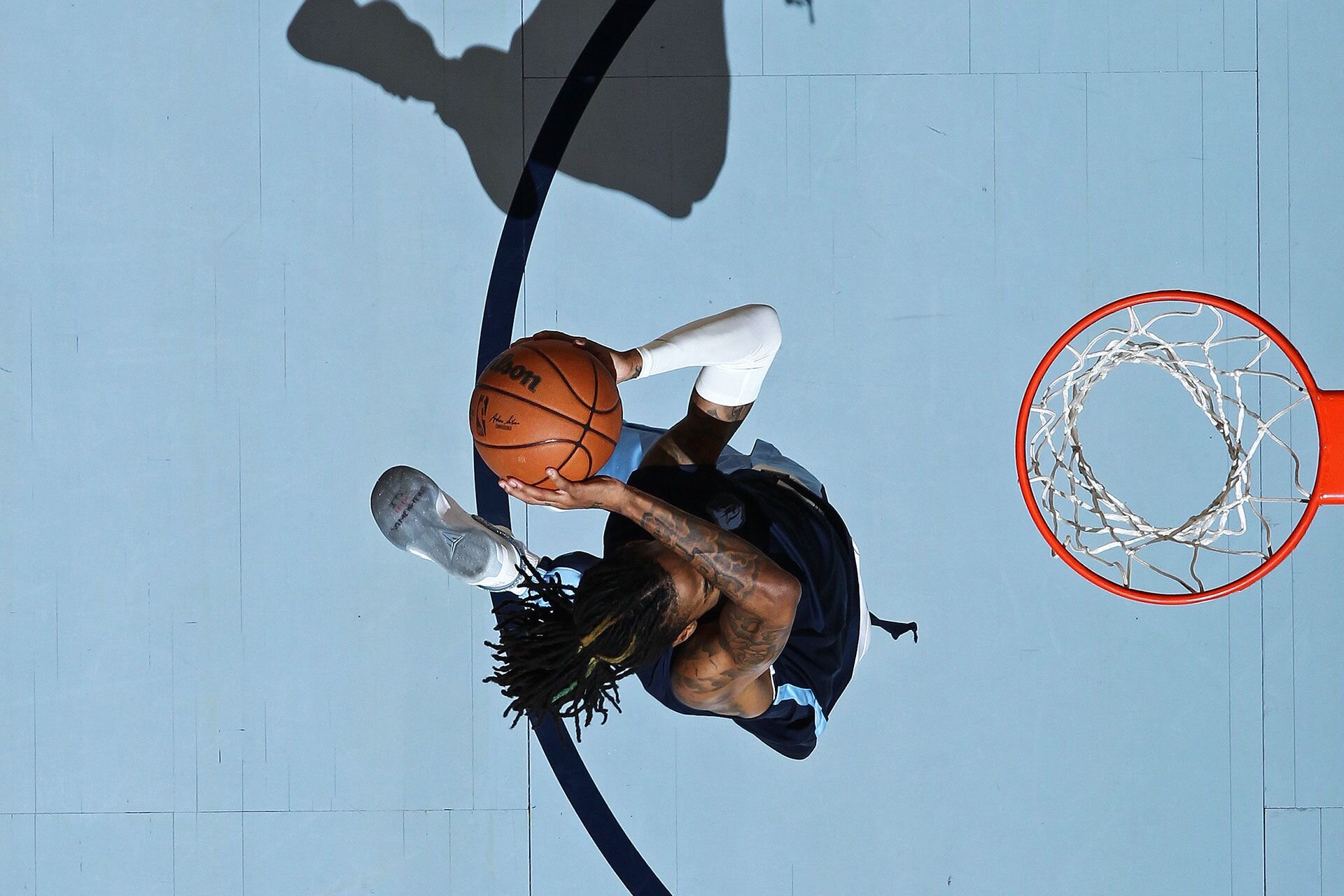 MEMPHIS, TN - DECEMBER 31: Ja Morant #12 of the Memphis Grizzlies warms up before the game against the Sacramento Kings on December 31, 2023 at FedExForum in Memphis, Tennessee.