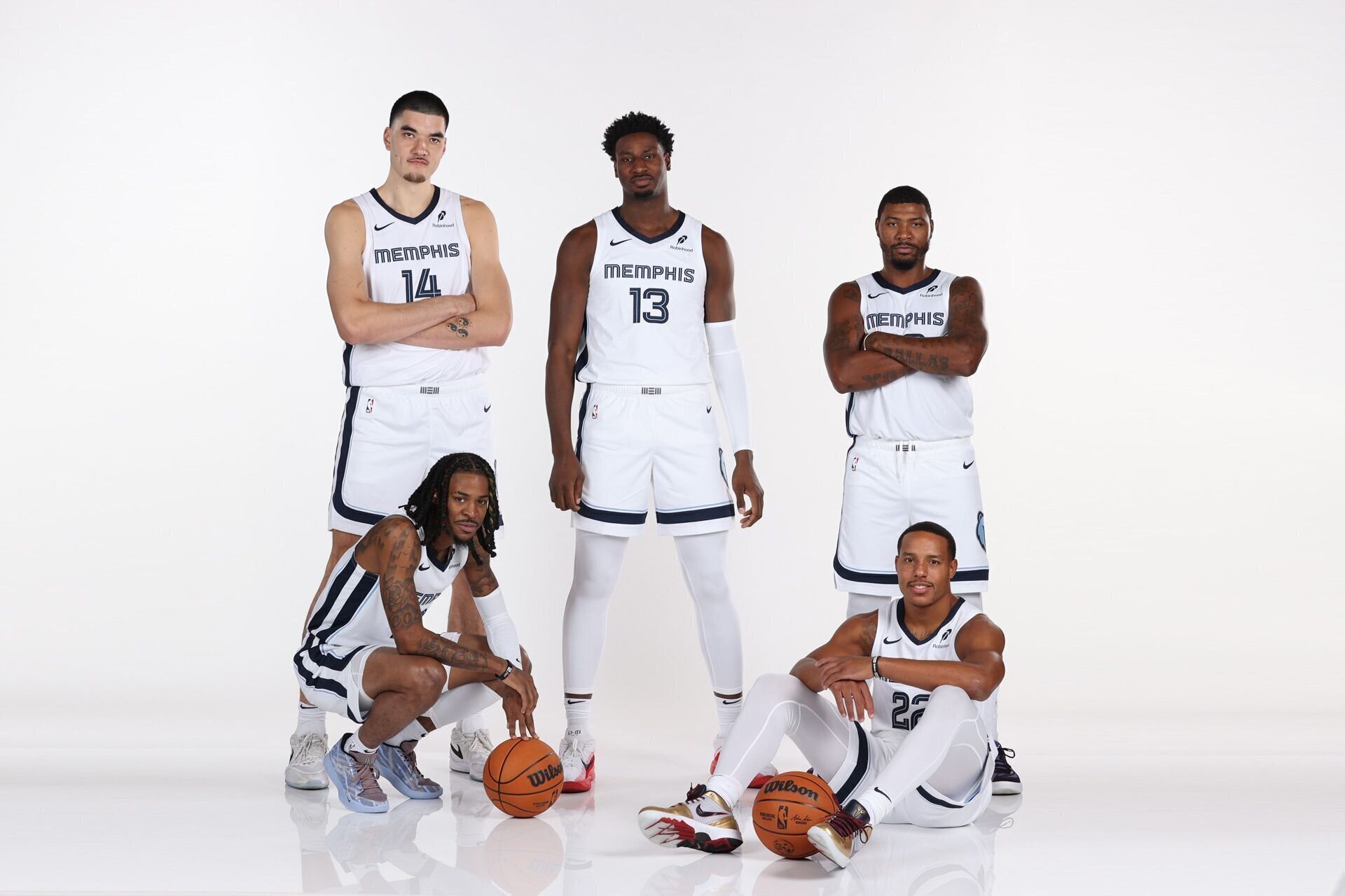 MEMPHIS, TN - SEPTEMBER 30: Ja Morant #12, Jaren Jackson Jr. #13, Desmond Bane #22, Marcus Smart #36 and Zach Edey #14 of the Memphis Grizzlies pose for a portrait on September 30, 2024 at FedExForum in Memphis, Tennessee.