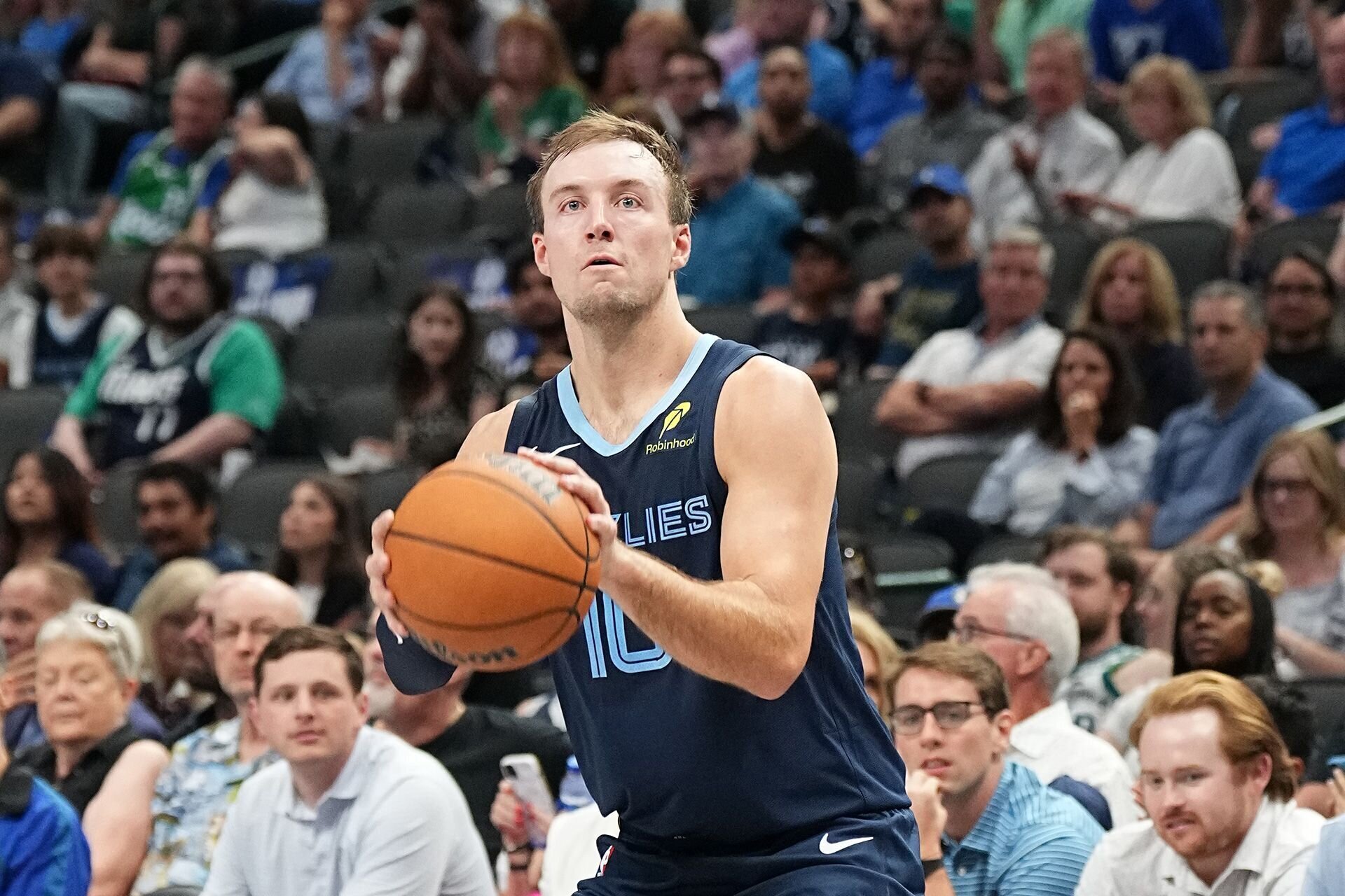 DALLAS, TX - OCTOBER 7: Luke Kennard #10 of the Memphis Grizzlies shoots a three point basket during the game against the Dallas Mavericks during the 2024 NBA Preseason on October 7, 2024 at American Airlines Center in Dallas, Texas.