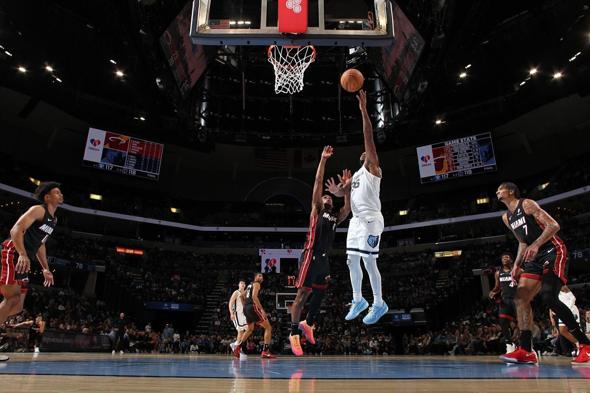 MEMPHIS, TN - OCTOBER 18: Marcus Smart #36 of the Memphis Grizzlies shoots the ball during the game against the Miami Heat during a NBA pre season game on October 18, 2024 at FedExForum in Memphis, Tennessee.