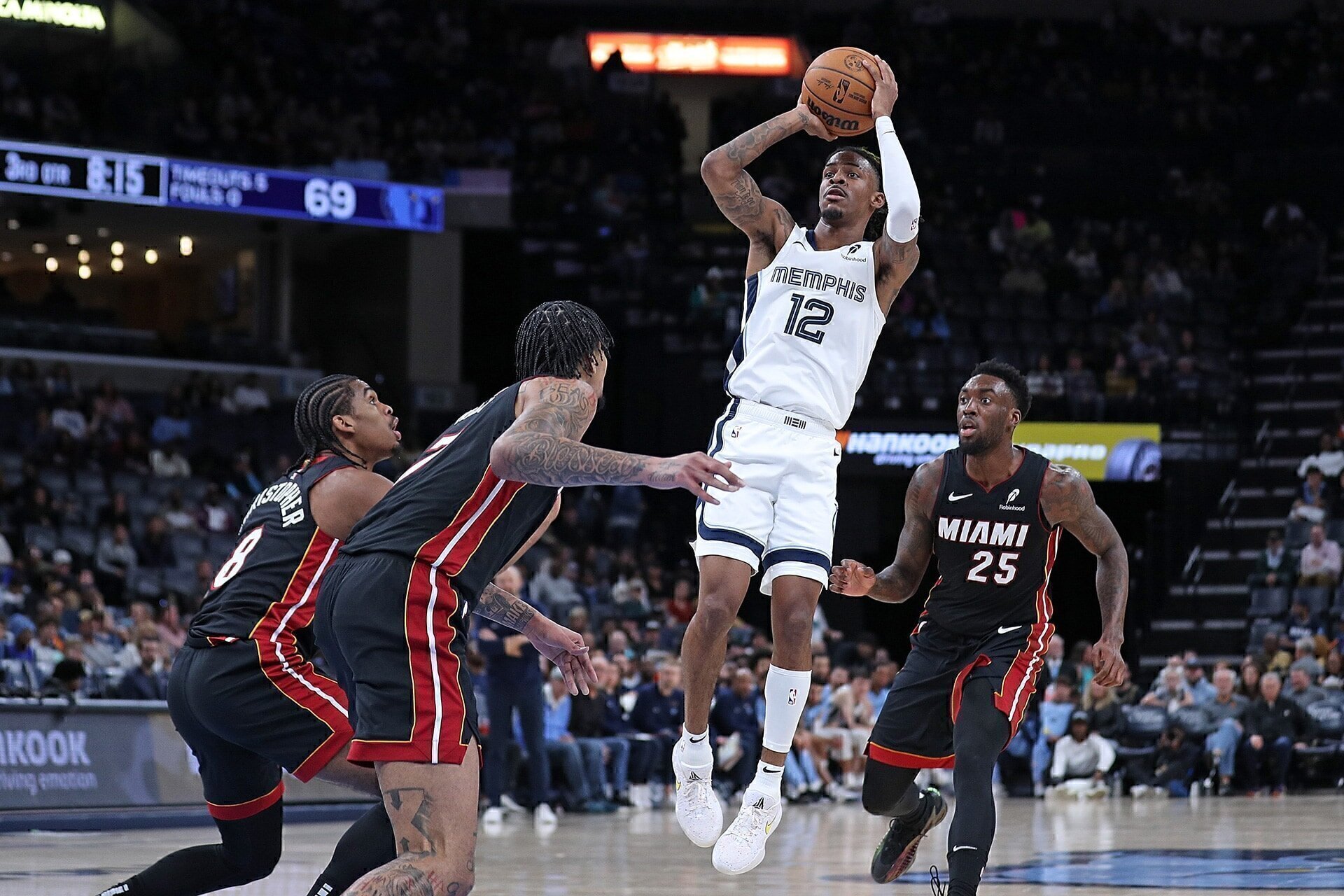 MEMPHIS, TENNESSEE - OCTOBER 18: Ja Morant #12 of the Memphis Grizzlies takes a shot during the second half against the Miami Heat at FedExForum on October 18, 2024 in Memphis, Tennessee.