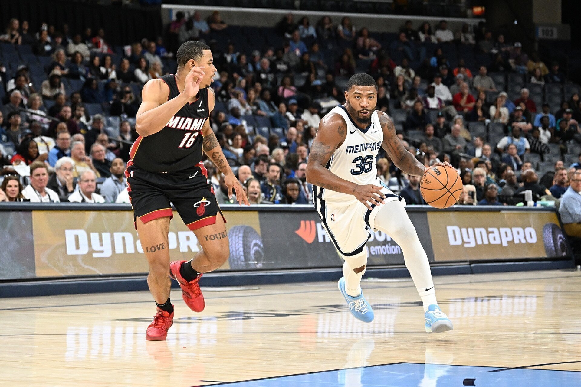 MEMPHIS, TN - OCTOBER 18: Marcus Smart #36 of the Memphis Grizzlies dribbles the ball during the game against the Miami Heat during a NBA preseason game on October 18, 2024 at FedExForum in Memphis, Tennessee.