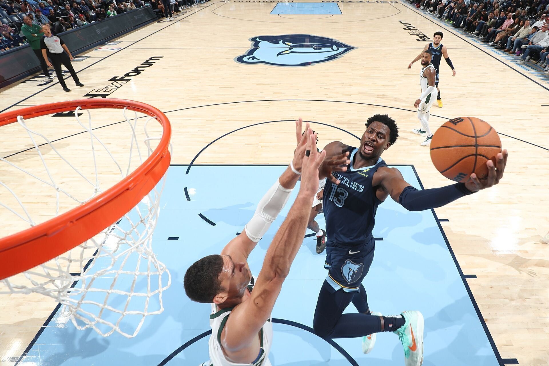 MEMPHIS, TN - OCTOBER 31: Jaren Jackson Jr. #13 of the Memphis Grizzlies drives to the basket during the game against the Milwaukee Bucks on October 31, 2024 at FedExForum in Memphis, Tennessee.