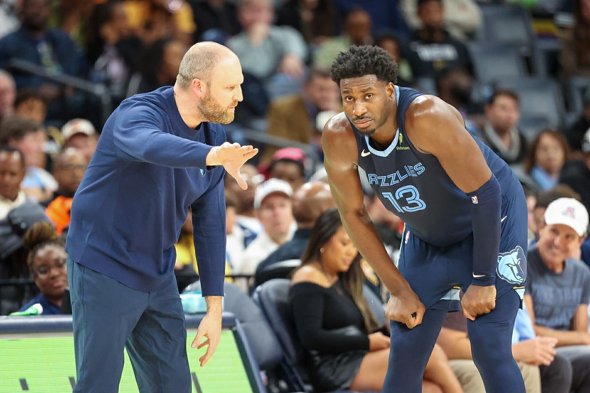 MEMPHIS, TENNESSEE - OCTOBER 31: Head Coach Taylor Jenkins and Jaren Jackson Jr. #13 of the Memphis Grizzlies talk during the second half against the Milwaukee Bucks at FedExForum on October 31, 2024 in Memphis, Tennessee.