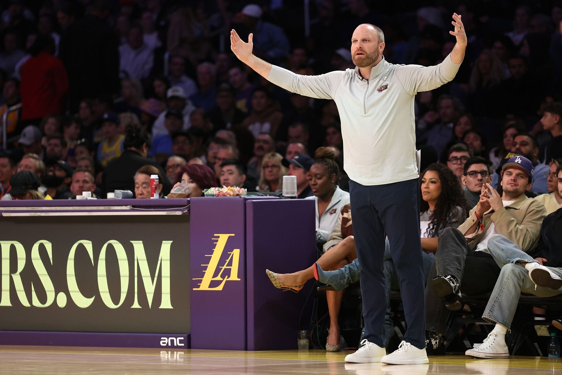 LOS ANGELES, CALIFORNIA - NOVEMBER 13: Head coach Taylor Jenkins of the Memphis Grizzlies gestures during the second quarter against the Los Angeles Lakers at Crypto.com Arena on November 13, 2024 in Los Angeles, California.