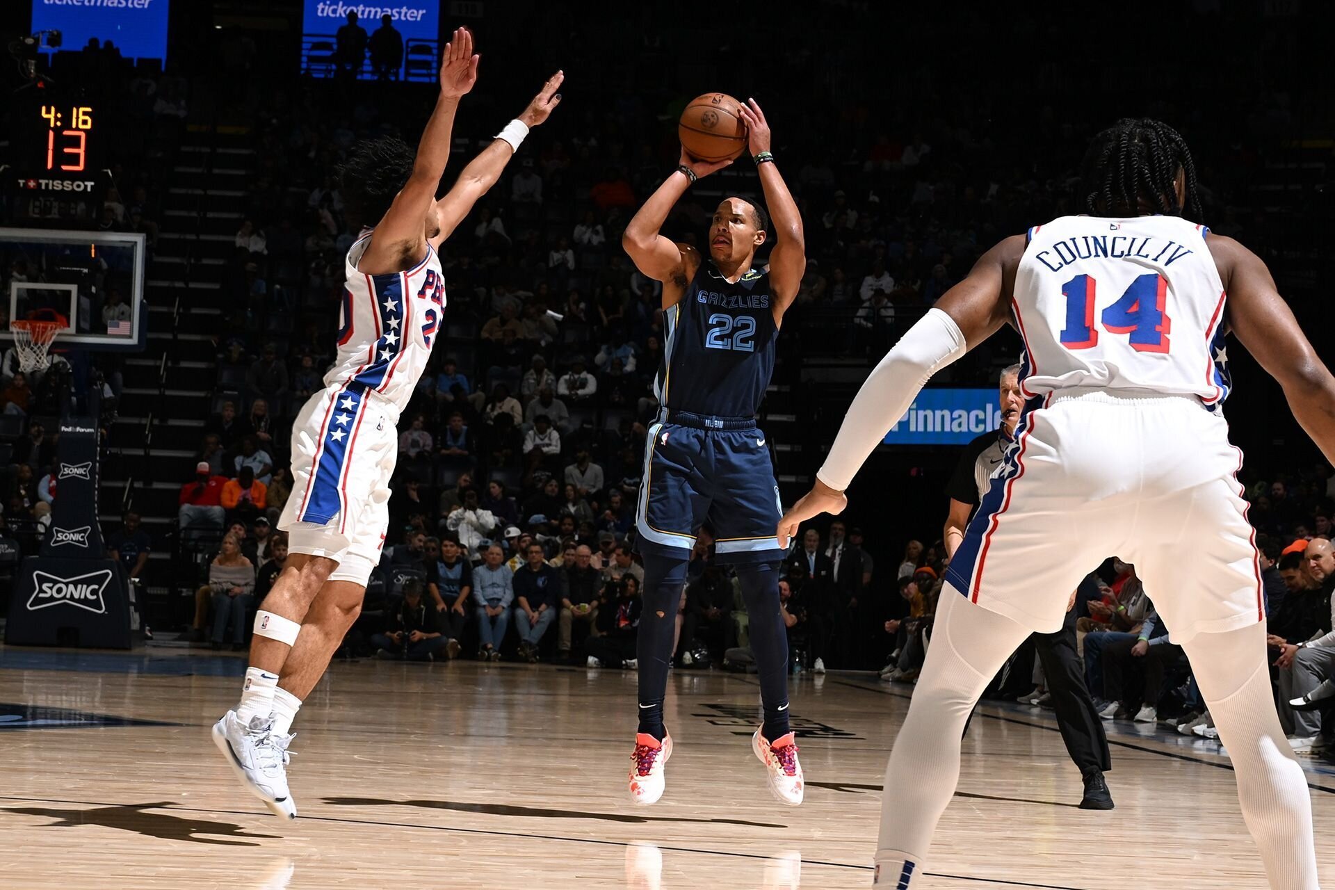 MEMPHIS, TN - NOVEMBER 20: Desmond Bane #22 of the Memphis Grizzlies shoots a three point basket during the game against the Philadelphia 76ers on November 20, 2024 at FedExForum in Memphis, Tennessee.