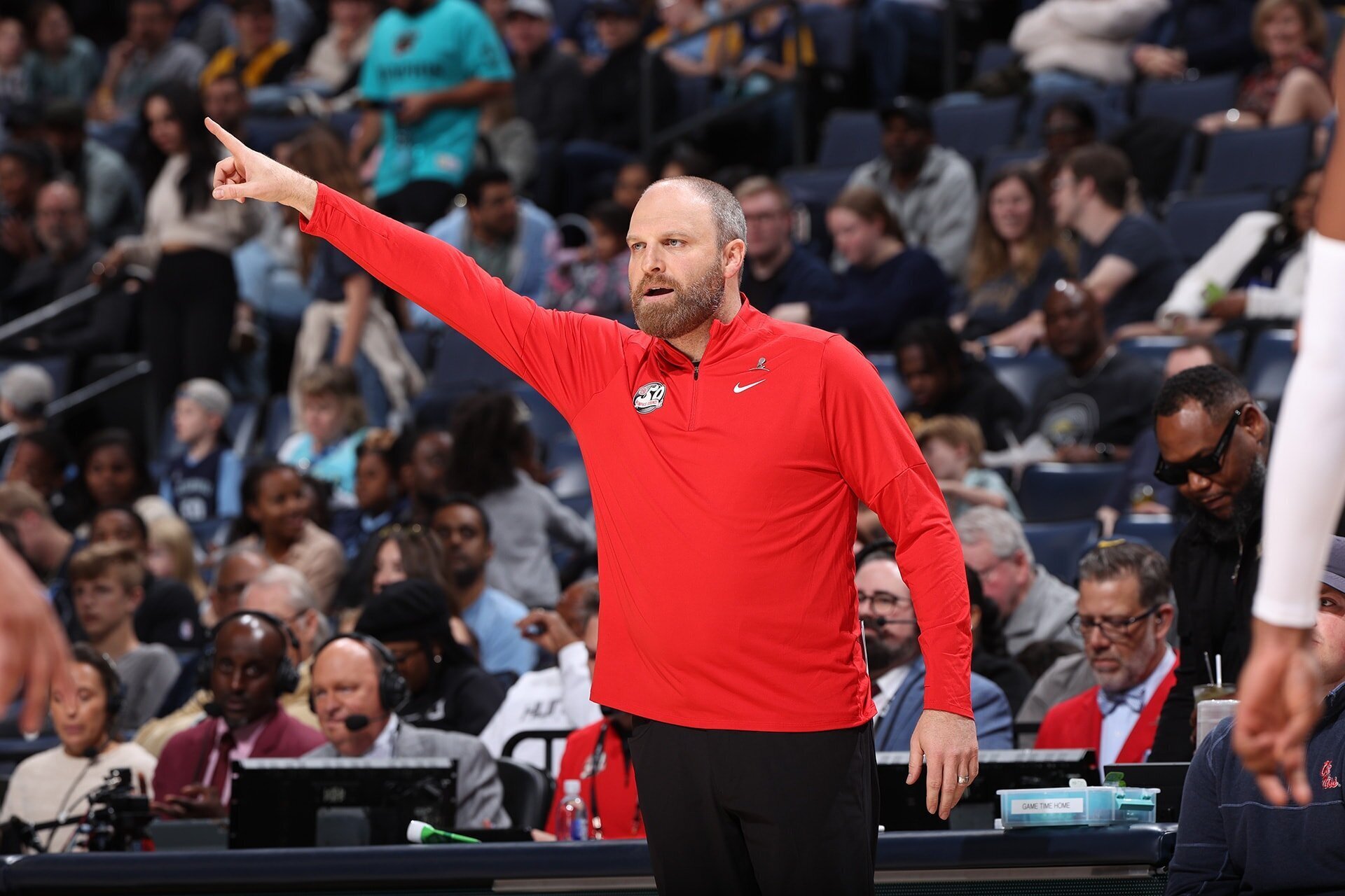 MEMPHIS, TN - NOVEMBER 17: Head Coach Taylor Jenkins of the Memphis Grizzlies calls a play during the game against the Denver Nuggets on November 17, 2024 at FedExForum in Memphis, Tennessee.