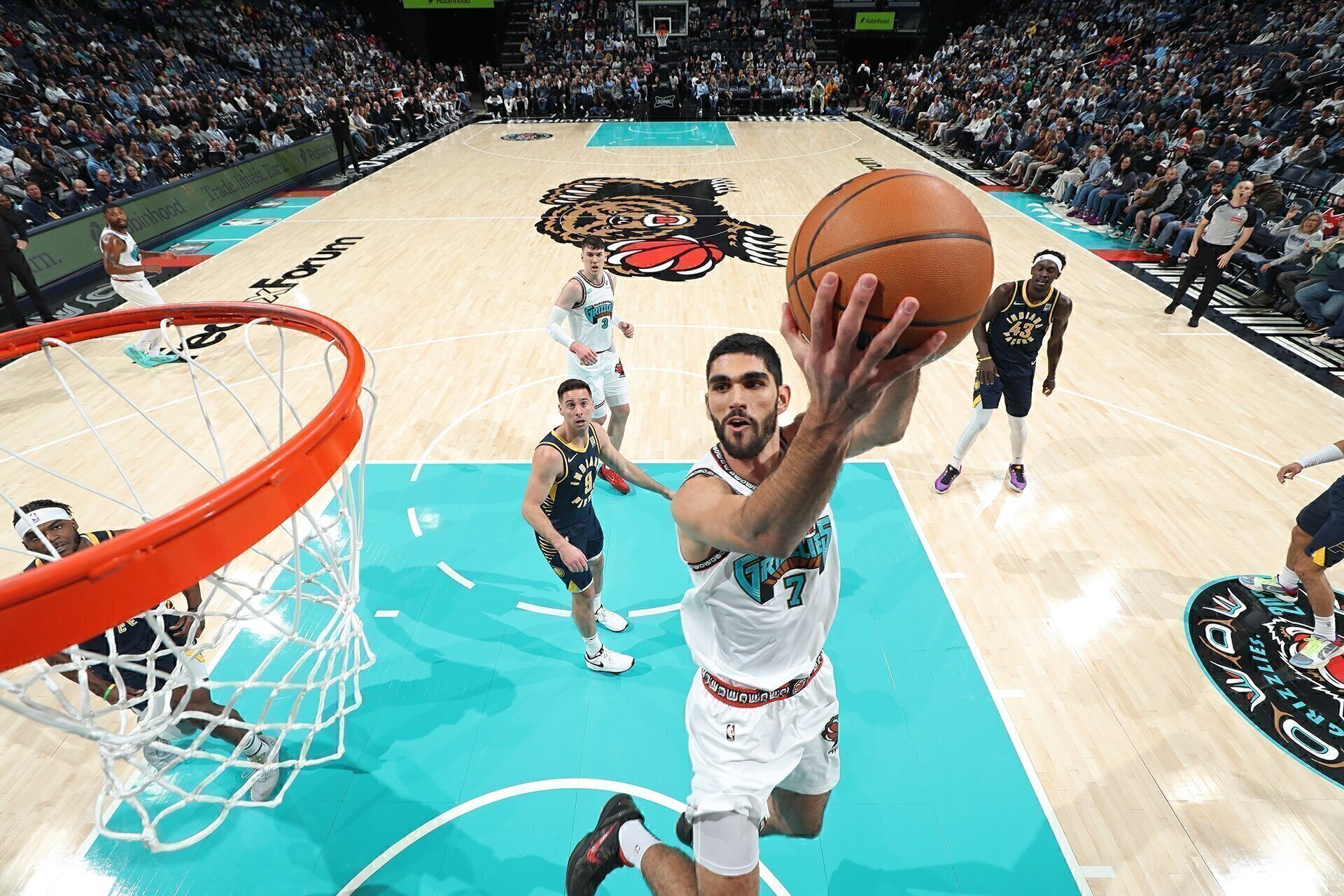 MEMPHIS, TN - DECEMBER 1: Santi Aldama #7 of the Memphis Grizzlies drives to the basket during the game against the Indiana Pacers on December 1, 2024 at FedExForum in Memphis, Tennessee.