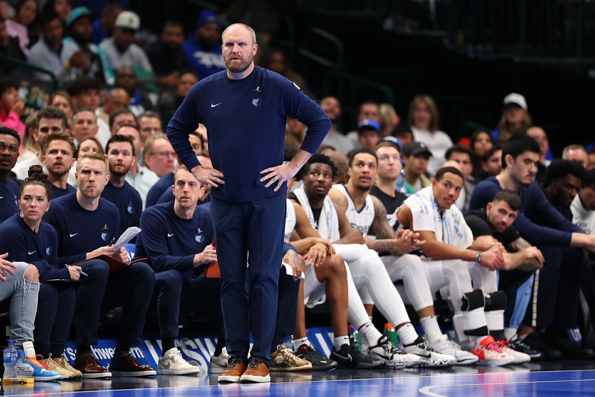 DALLAS, TEXAS - DECEMBER 03: Head coach Taylor Jenkins of the Memphis Grizzlies looks on during the first half of an Emirates NBA Cup game against the Dallas Mavericks at American Airlines Center on December 03, 2024 in Dallas, Texas.