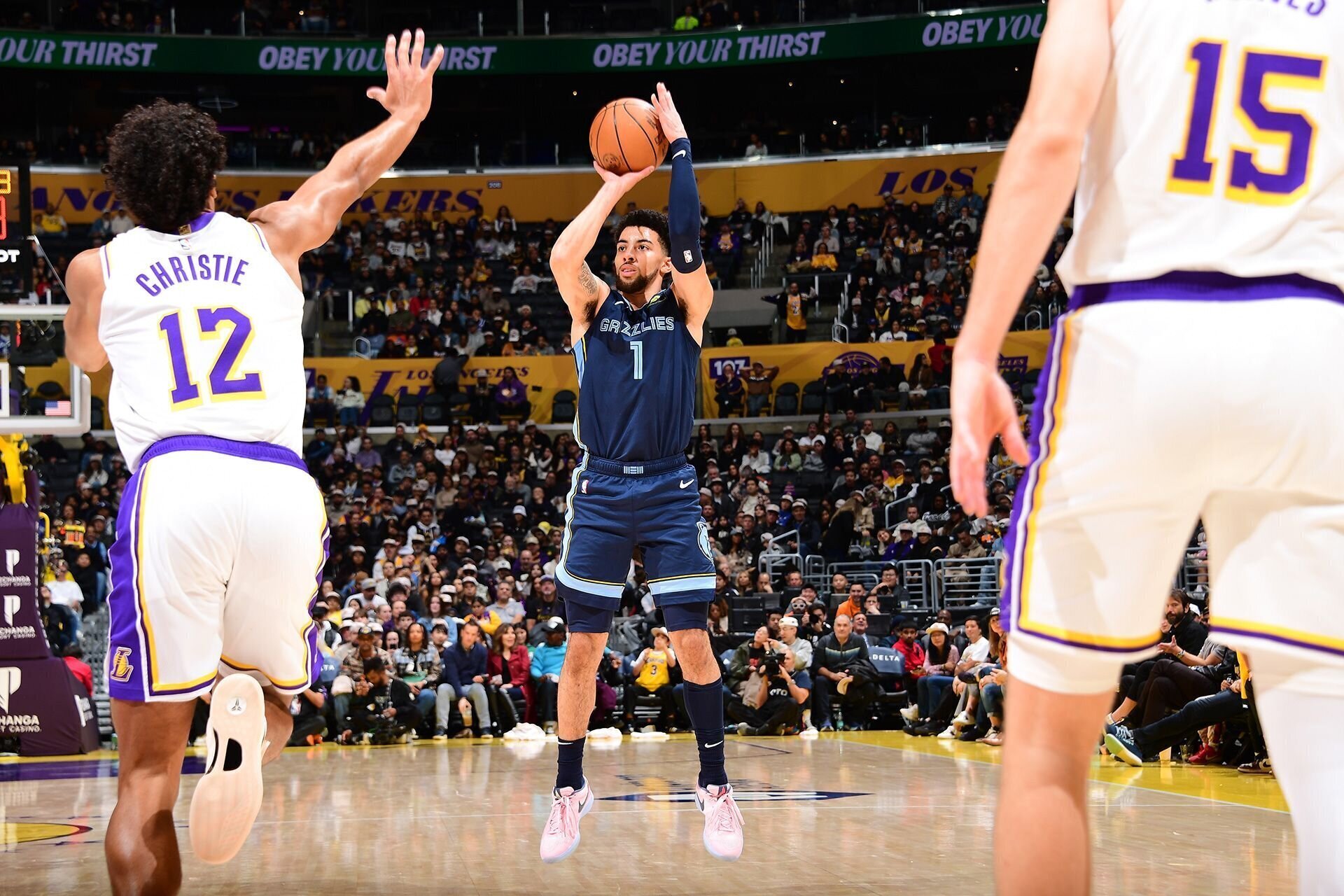 LOS ANGELES, CA - DECEMBER 15: Scotty Pippen Jr. #1 of the Memphis Grizzlies shoots a three point basket during the game against the Los Angeles Lakers on December 15, 2024 at Crypto.Com Arena in Los Angeles, California.