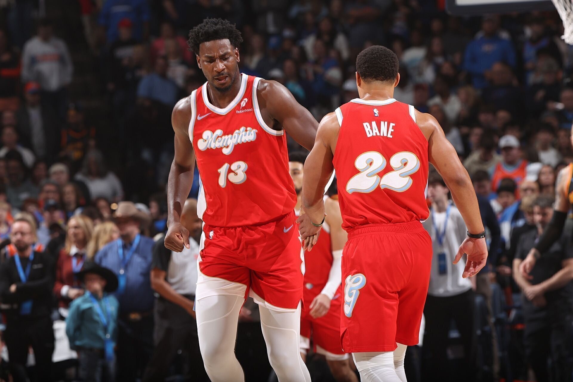 OKLAHOMA CITY, OK - DECEMBER 29: Jaren Jackson Jr. #13 and Desmond Bane #22 of the Memphis Grizzlies high five during the game against the Oklahoma City Thunder on December 29, 2024 at Paycom Center in Oklahoma City, Oklahoma.