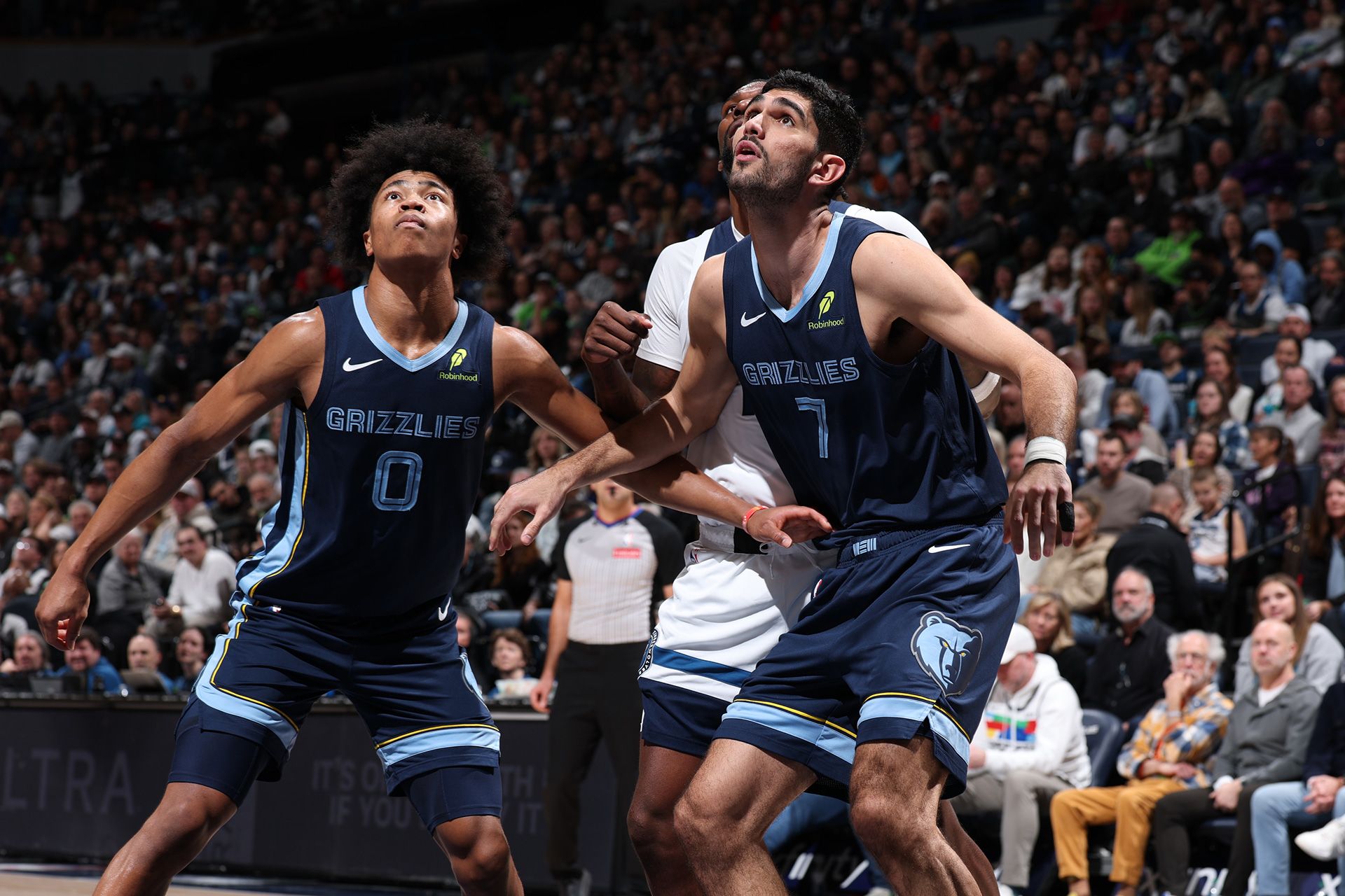 MINNEAPOLIS, MN -  JANUARY 11:  Jaylen Wells #0 and Santi Aldama #7 of the Memphis Grizzlies plays defense during the game against the Minnesota Timberwolves on January 11, 2025 at Target Center in Minneapolis, Minnesota.