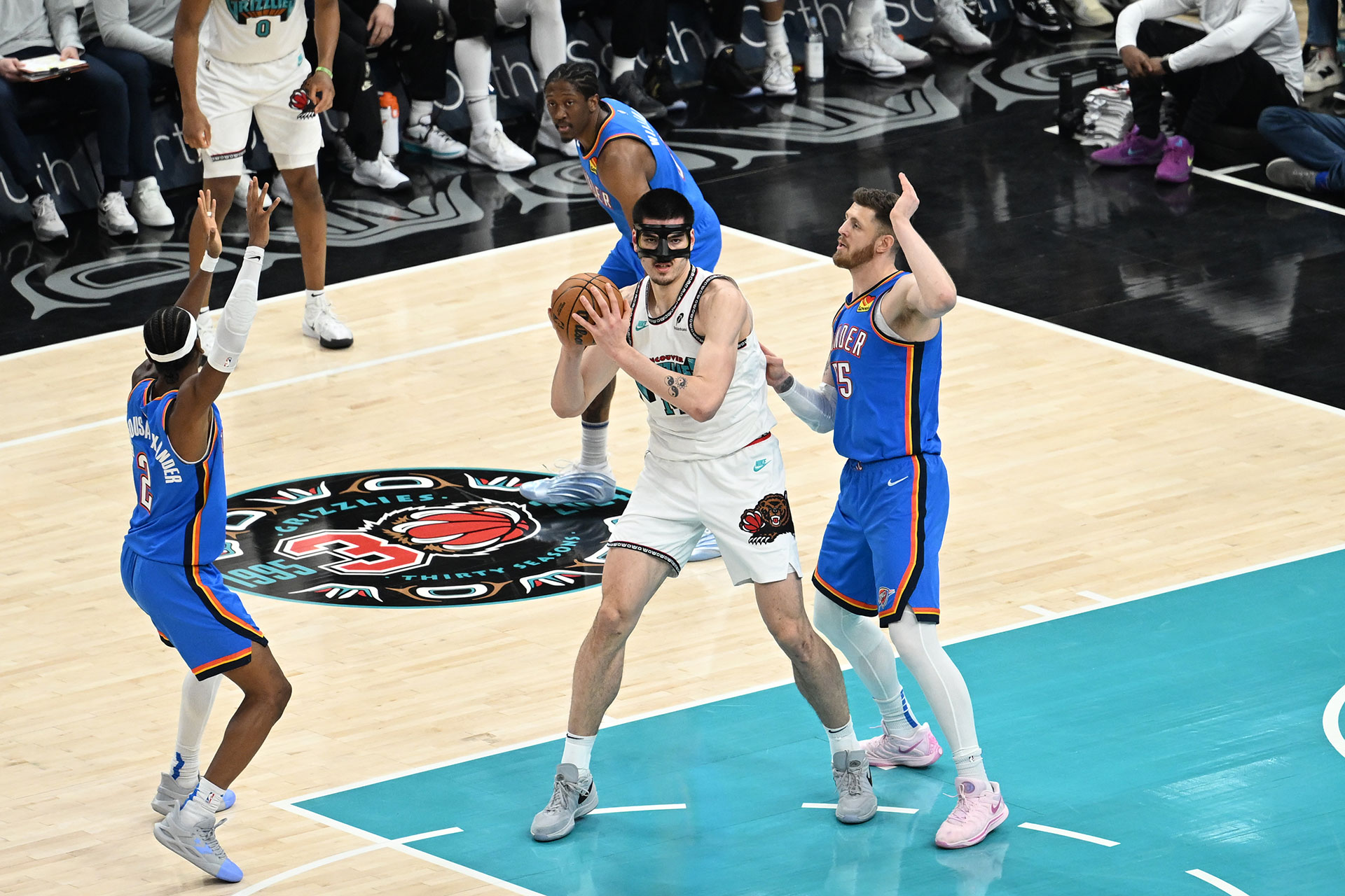 MEMPHIS, TN - FEBRUARY 8: Zach Edey #14 of the Memphis Grizzlies handles the ball during the game against the Oklahoma City Thunder  on February  8, 2025 at FedExForum in Memphis, Tennessee.