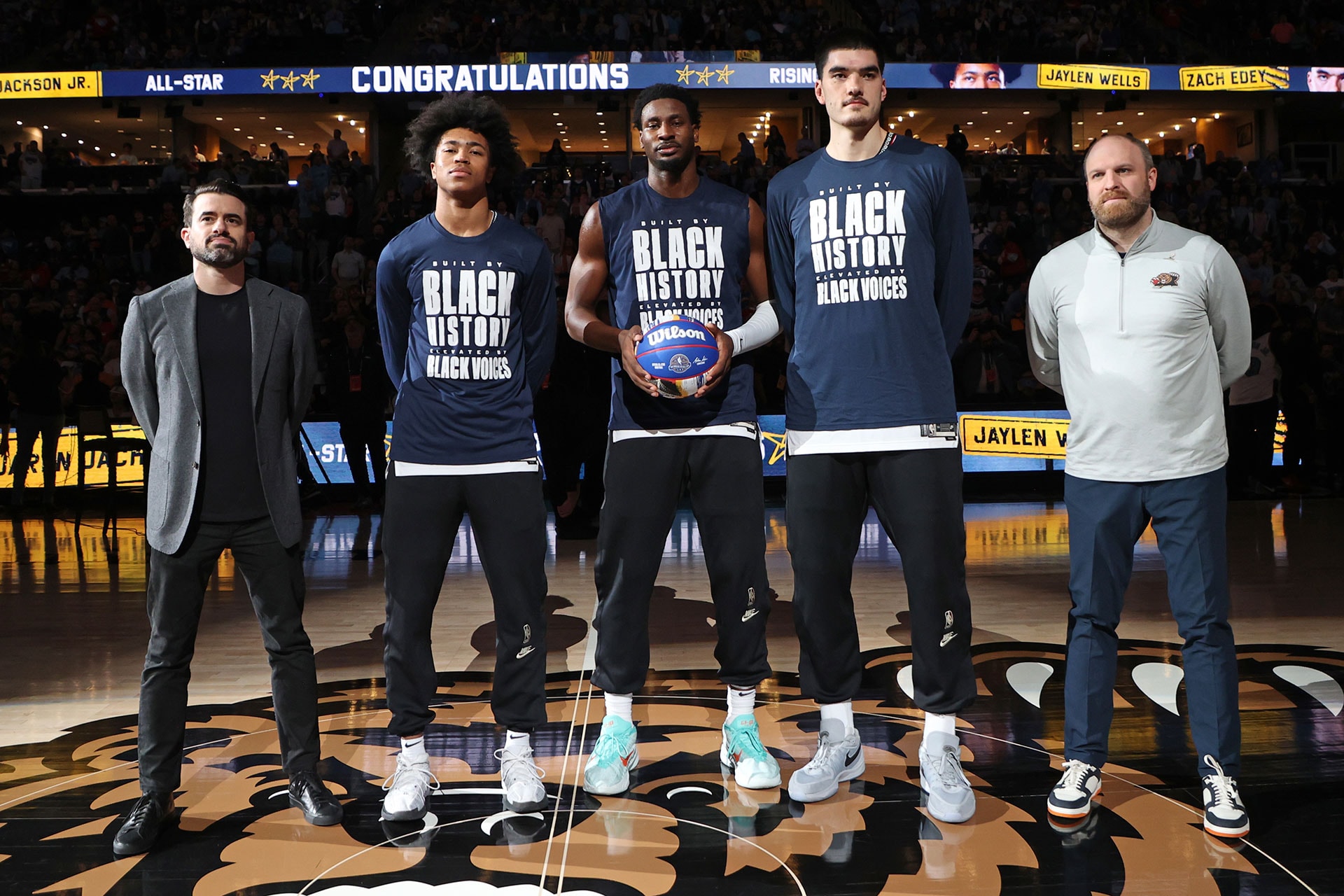 MEMPHIS, TN - FEBRUARY 8:  Jaylen Wells #0, Jaren Jackson Jr. #13 and Zach Edey #14 of the Memphis Grizzlies are honored before the game against the Oklahoma City Thunder  on February 8, 2025 at FedExForum in Memphis, Tennessee.