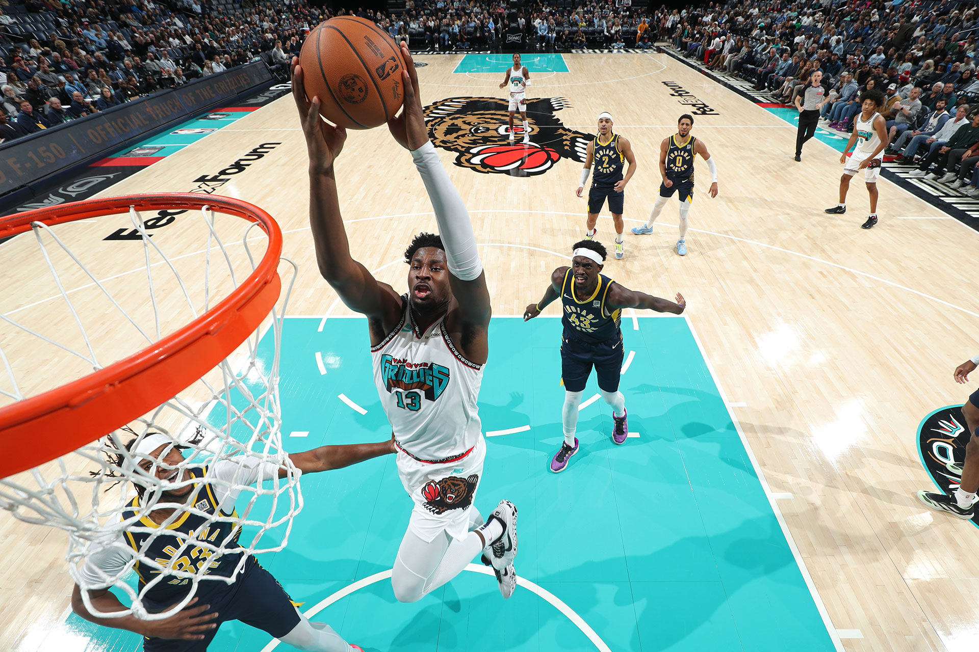 MEMPHIS, TN - DECEMBER 1: Jaren Jackson Jr. #13 of the Memphis Grizzlies dunks the ball during the game against the Indiana Pacers on December 1, 2024 at FedExForum in Memphis, Tennessee.