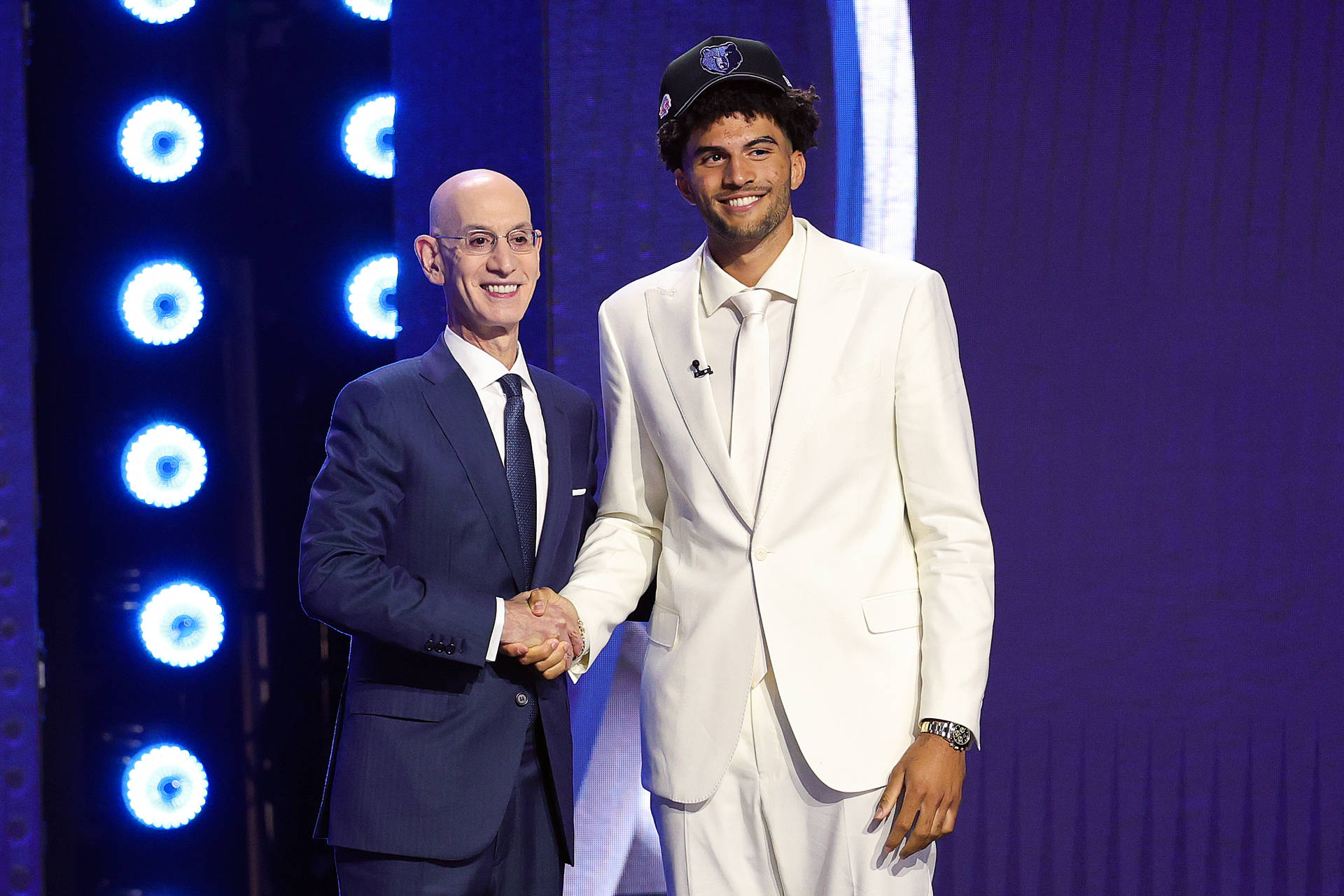 NEW YORK, NEW YORK - JUNE 23:  NBA commissioner Adam Silver shakes hands with Cameron Boozer after he is drafted third overall by the Memphis Grizzlies during Round One of the 2026 NBA Draft at Barclays Center on June 23, 2026 in New York City.