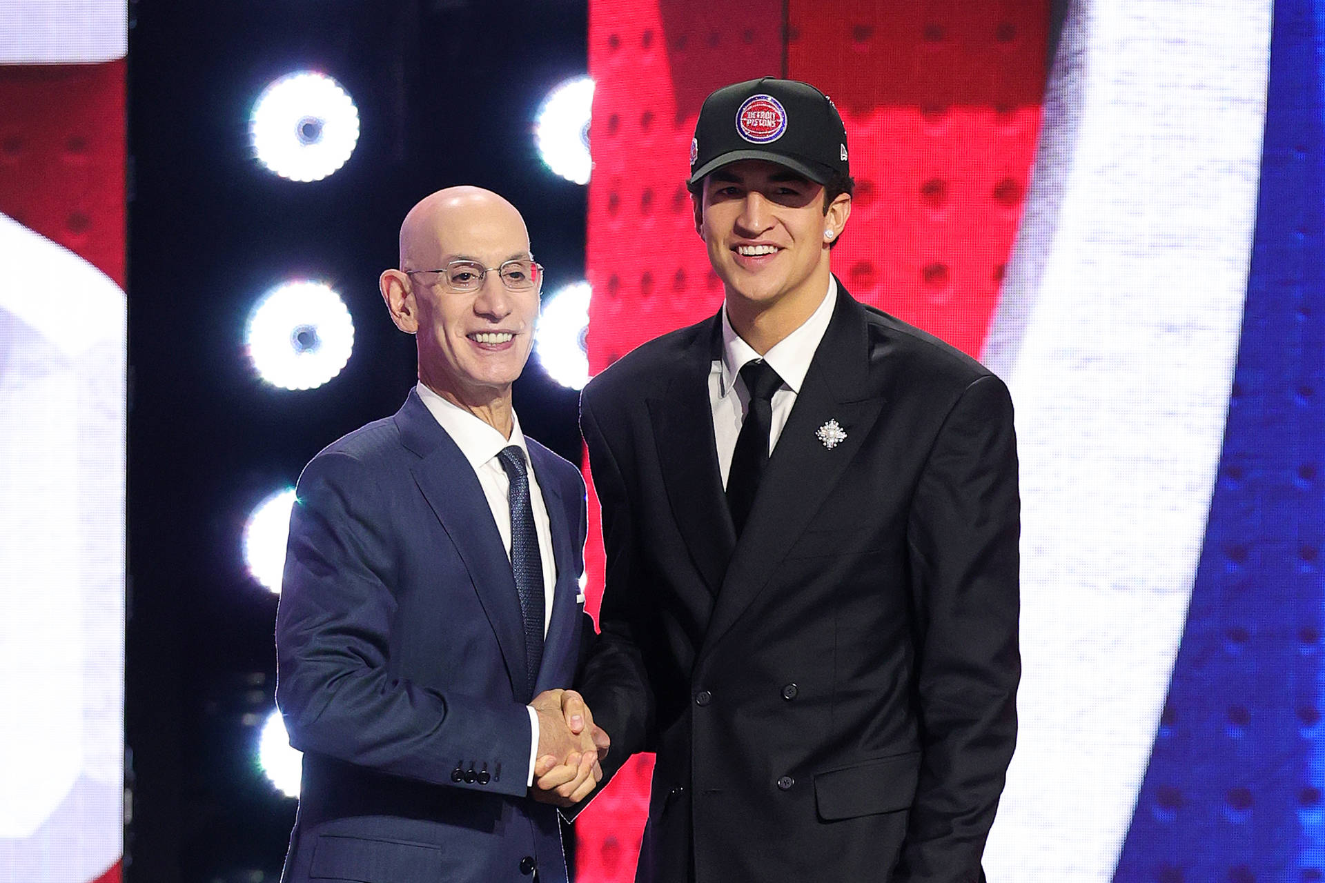 NEW YORK, NEW YORK - JUNE 23:  NBA commissioner Adam Silver shakes hands with Karim López after he is drafted twenty-first overall by the Detroit Pistons during Round One of the 2026 NBA Draft at Barclays Center on June 23, 2026 in New York City.